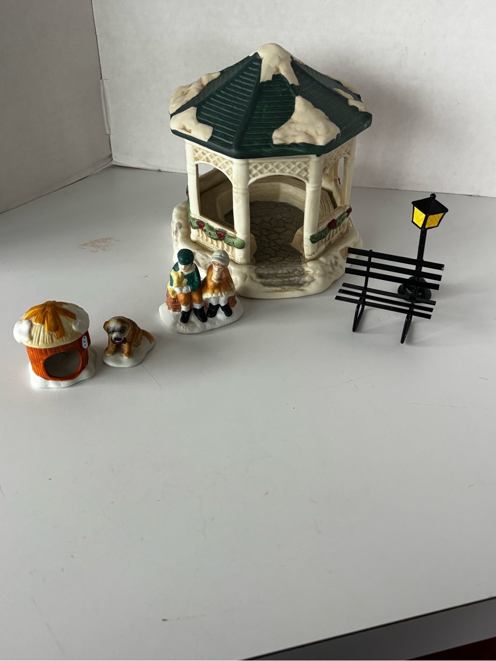 Vintage House of Lloyd and Lemax Gazebo and Figurines.
